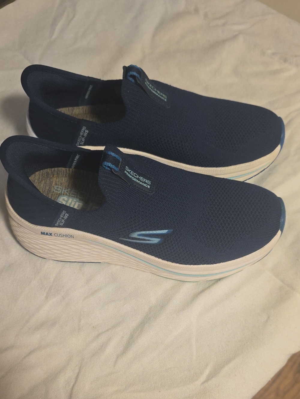 Skechers Slip-On Max Cushion Walking Sneakers in Navy and Light Blue